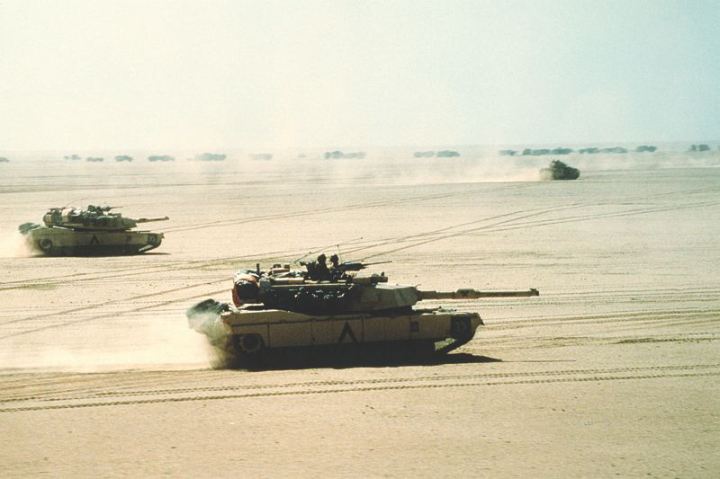 M-1A1 Abrams main battle tanks of the 3rd Armored Division move out on a mission during Operation Desert Storm.
